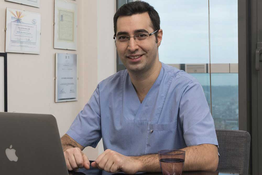 Dr. Ali Emre Karadeniz at his desk